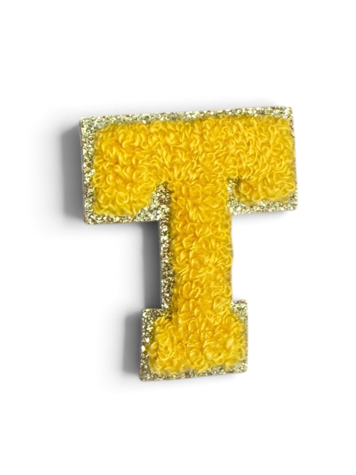 T Klebe-Buchstaben