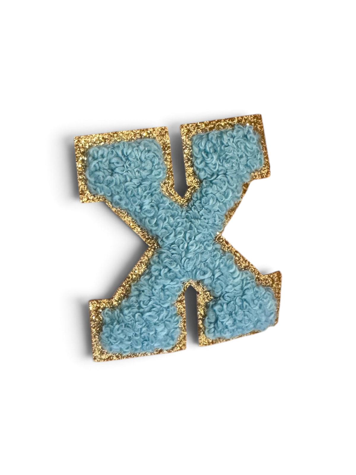 X Klebe-Buchstabe