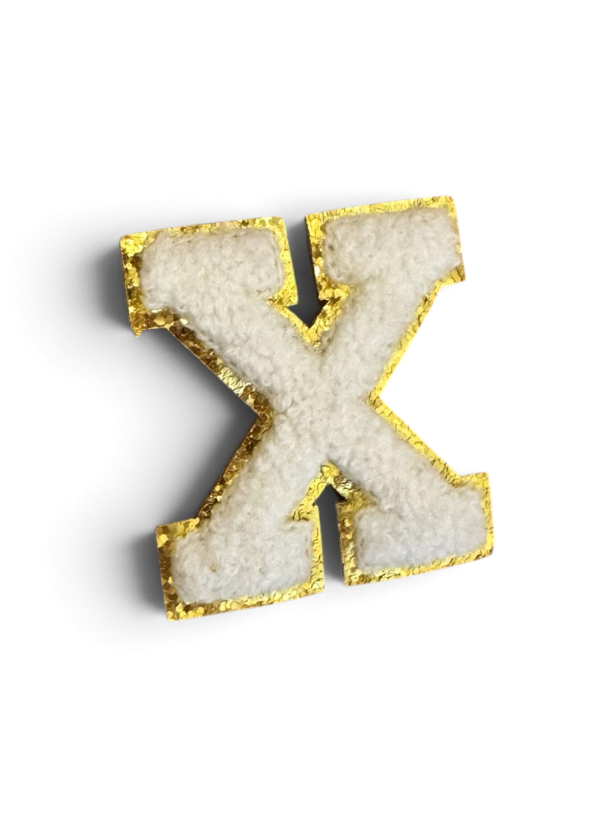 X Klebe-Buchstabe