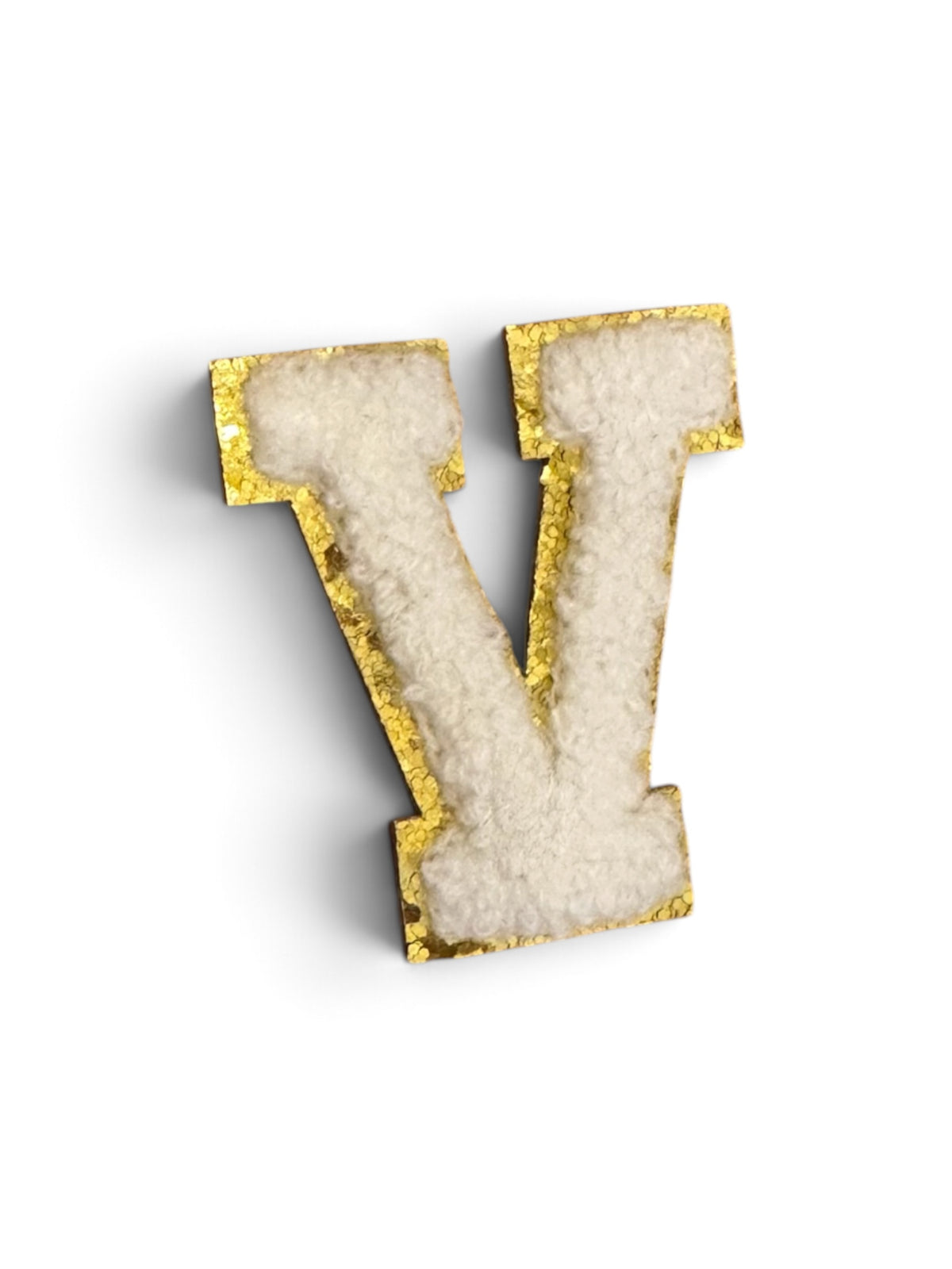 V Klebe-Buchstaben