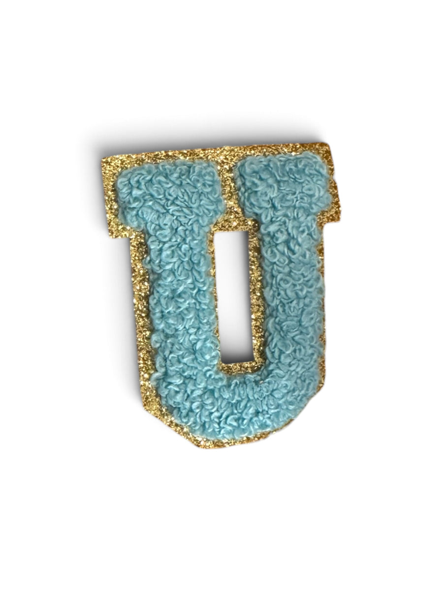 U Klebe-Buchstaben