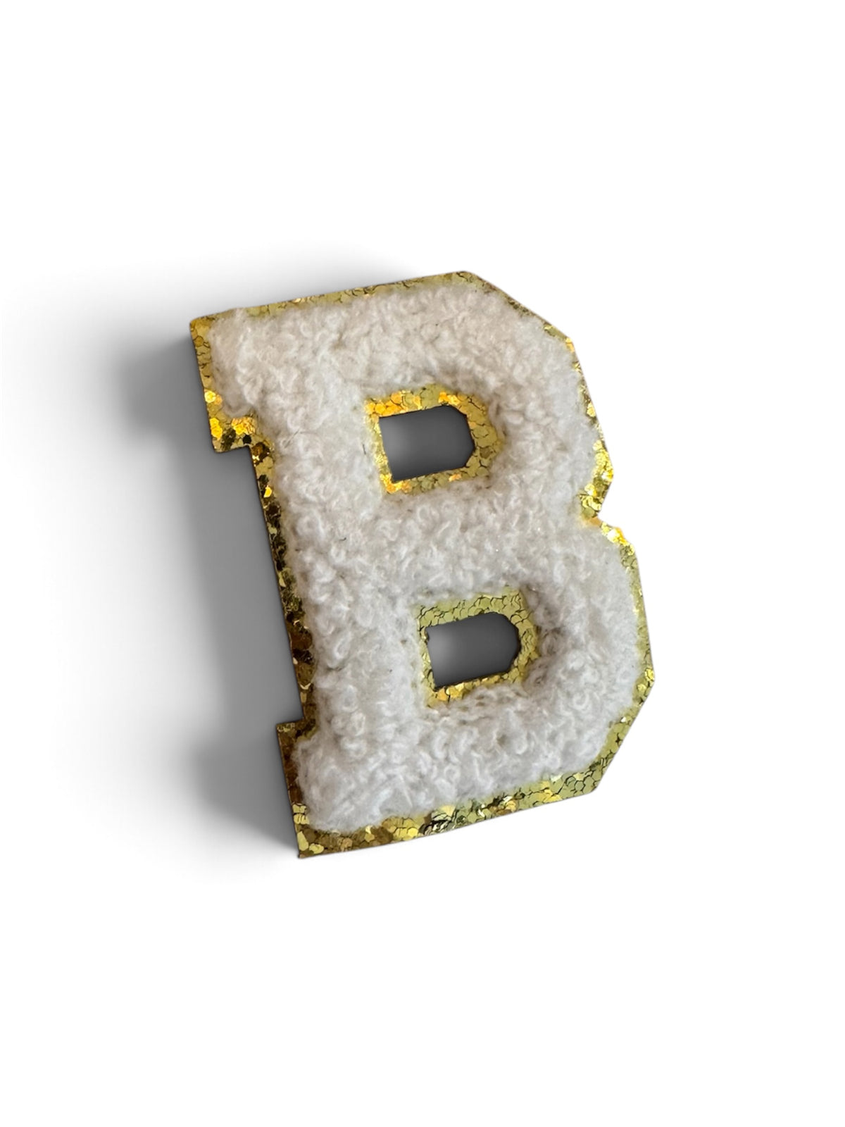 B Klebe-Buchstabe