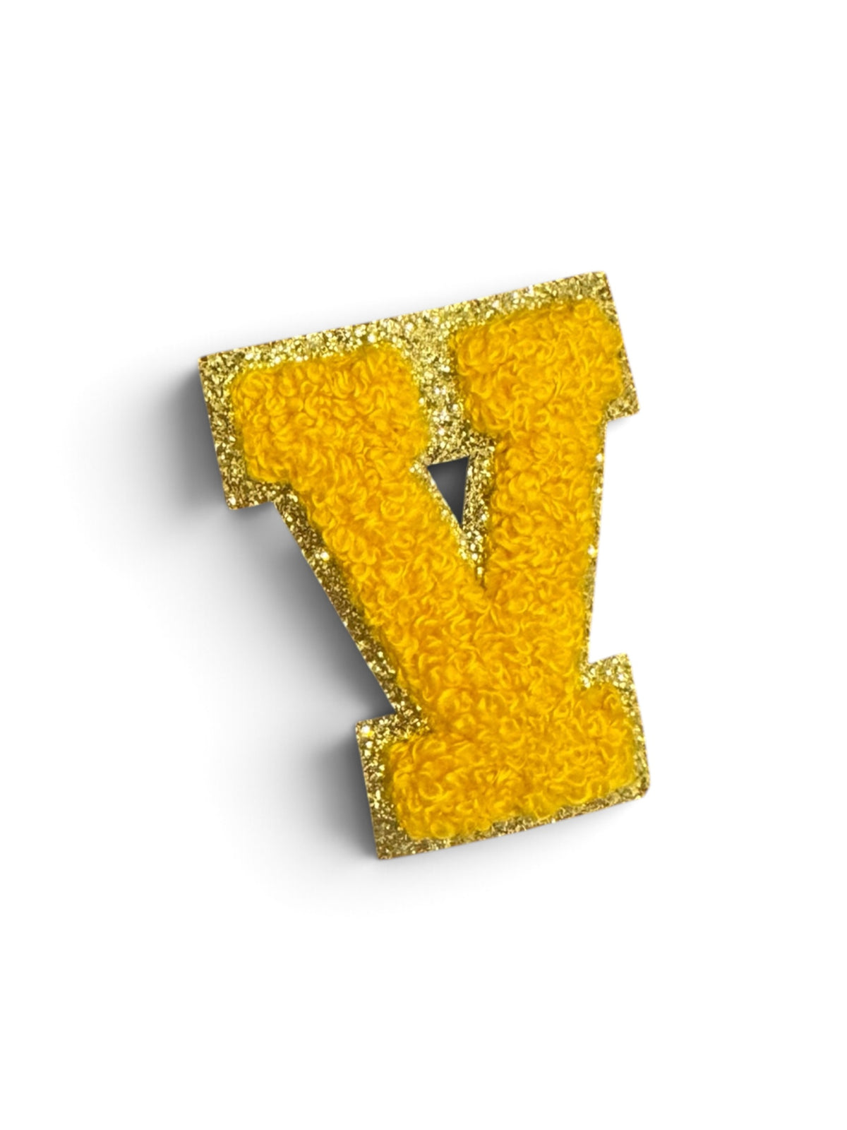 V Klebe-Buchstaben