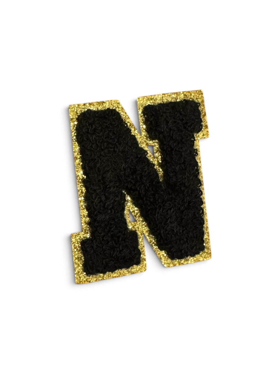 N Klebe-Buchstabe